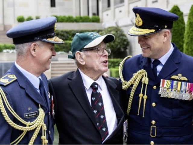Chief of Air Force Royal New Zealand Air Force, Air Vice-Marshal Darryn Webb, left, and Chief of Air Force Air Marshal Stephen Chappell flank Air Force veteran Charles Reif at the Australian War Memorial, Canberra. Photo: Aircraftman Jakob Reid