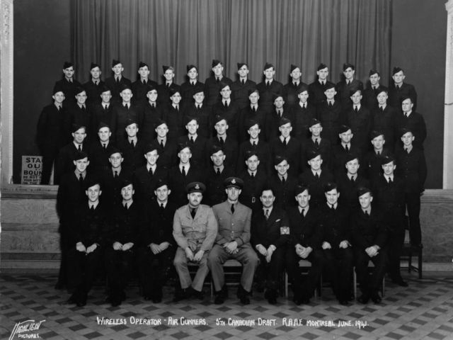 Group portrait of Wireless Operators and Air Gunners of the 5th Canadian Draft (Canada 5) , RAAF course held at the Wireless School, Montreal, Canada over the period 2 February 1941 to 23 June 1941.