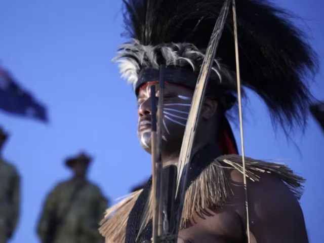 In the Torres Strait, warrior garments are donned for Anzac Day dawn service