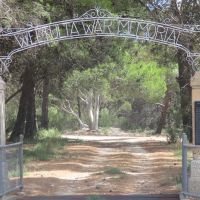 Gates with wrought iron title in place