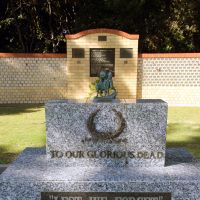 Sawtell RSL Memorial Park Stone of Remembrance with Commemorative Wall in the Background