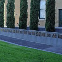 Plaques attached to retaining wall of Bendigo Military Museum