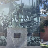 Statue: 'Helping Hand' by CW Gilbert