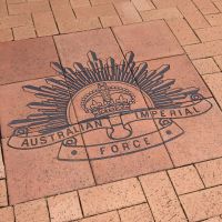 Logo of Australian Imperial Force in brick pavers