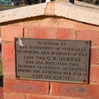 Plaque on exit commemmorating the residents of Coimadai who built the memorial