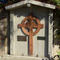 The Commemorative Cross, set behind a transparent cover