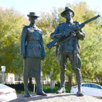 The Indigenous woman and man atop the Memorial