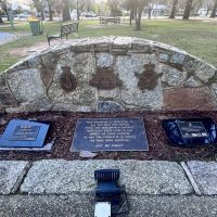 To the right of the large stone cenotaph