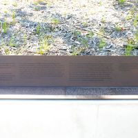 The plaque describing the symbolism of the Memorial