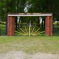 Adelong Memorial Gates, with the years 1939 and 1945 on the side gates