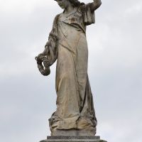  The figure of "Remembrance" holding a wreath