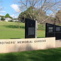 Toowoomba Mothers' Memorial Gardens Commemorative Wall with the Mothers' Memorial in the Background