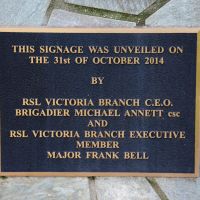 The signage unveiling plaque