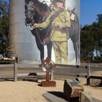 The Light Horseman with the memorial cross in front