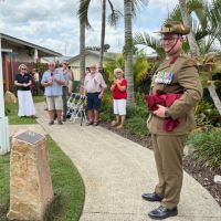 The Colonel unveiling the Plaque 