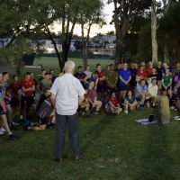 photo is of players at the end of training acknowledging the anniversary of the death of former Club Captain, John McNutt