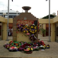 Memorial Flame Gympie adorned with wreaths for ANZAC Day 2012