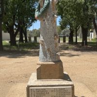 Original memorial looking east, with entrance gates behind