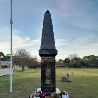 Toongabbie (Victoria) Cenotaph with wreaths laid respectfully at base after the official dedication ceremony