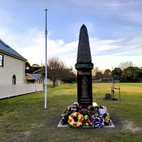 Toongabbie (Victoria) Cenotaph with wreaths laid respectfully at base after the official dedication ceremony