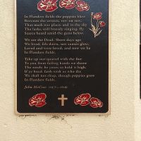 The plaque bearing 'In Flanders Fields' by Canadian John McRae