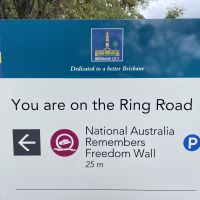 Direction sign to National Australia Remembers Freedom Wall