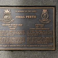 The plaque commemorating the two ships commissioned into the RAN as HMAS Perth