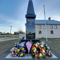 cenotaph with flower wreath at base
