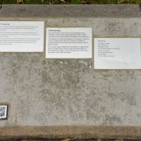 The third group of interpretive panels. One has the second verse of 'River Music'