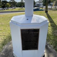 Plaque on the base of the Flagpole