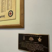 Plaque placement is next to the WWII Council Memorial