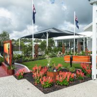 Memorial Garden in bloom with Lone Pine in for ground