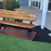 One of two seats overlooking the memorial garden