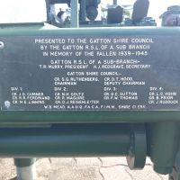 Plaque on 40mm gun, reads "Presented to the Gatton Shire Council by the Gatton R.S.L. of A. Sub Branch in memory of the fallen 1939-1945" Plaque then gives name and position details of RSL president and Gatton Shire Council members from divisions 1-4.