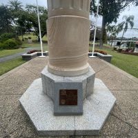 Plaque in context at the base of the 1952 memorial