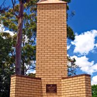 Brick Column with 4 supports . With a propeller on top