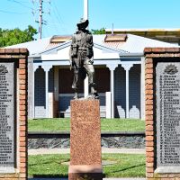 Sculpture With Brick Pillars and Plaques