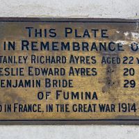 Plaque on back of column