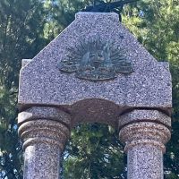 Top of the Memorial, with rising sun and miniature cannon