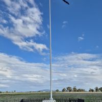 Plaque and Flag Memorial in Field 