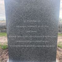 Inscription on the granite block on which the statue stands.