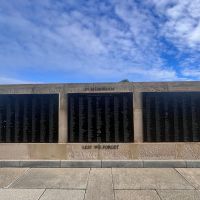 Behind the obelisk is a series of three panels 'commemorating those from the City of Bayside who paid the supreme sacrifice in all wars'