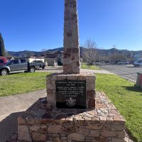 The monument stands in front of the Services Memorial Hall