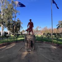 Light Horse memorial with flags