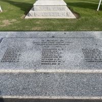 Granite slab in front of WWI memorial, listing the names of those who gave their lives in WWII