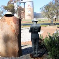Weethalle War Memorial Sculptures and Stone of Remembrance with Main War Memorial and Silo art in the Background